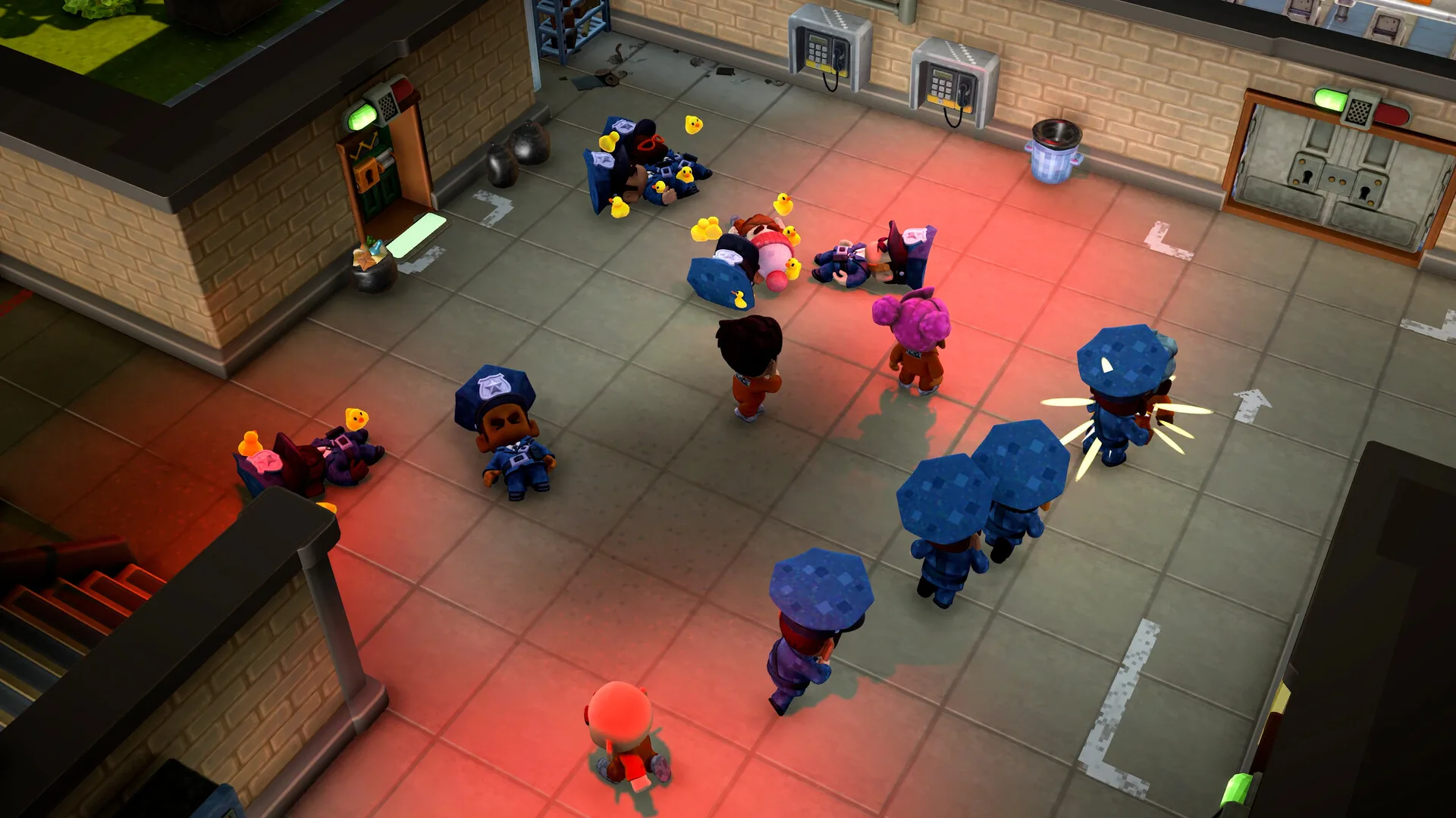 Official The Escapists 3 screenshot showing inmates in orange jumpsuits in a corridor lit by red emergency lights while incapacitated guards lie on the floor, slapstick proof that everyday objects change fights